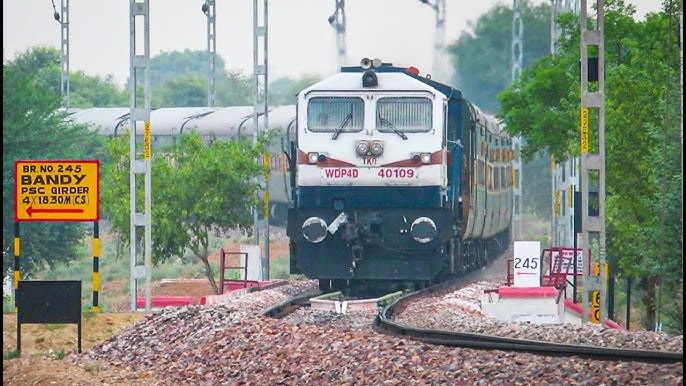 Stones are placed on railroad tracks for a variety of purposes